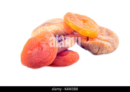 Dried apricots and figs isolated on white background Stock Photo
