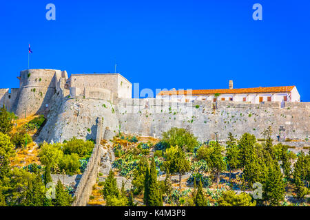 View at historic fort in town Hvar, famous landmark and viewpoint in Croatia, Europe. Stock Photo