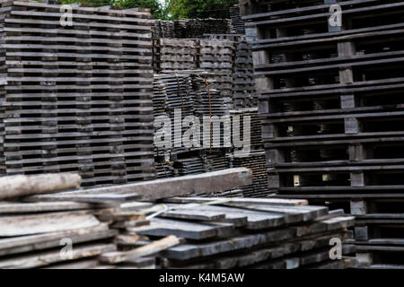 Piled of old and gray timber planks Stock Photo