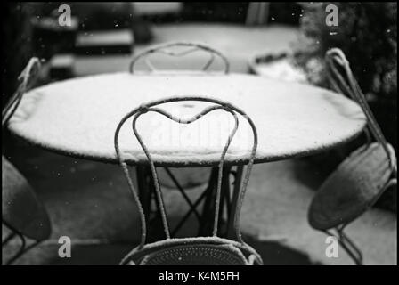SNOW FALL - WINTER - WINTER SEASON - EMPTY TABLE - SNOW FLAKES - FIRST SNOW FLAKES - FRANCE © Frédéric BEAUMONT Stock Photo