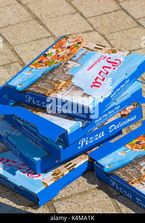 pizza boxes - stack of pizza delicious boxes at Bournemouth, Dorset UK in August Stock Photo