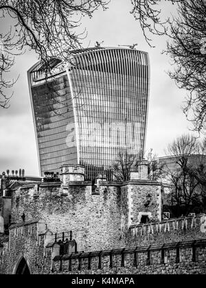 London , March 2017 United Kingdom: View of 20 Fenchurch St. building called walkie talkie and Tower of London Walls - historic castle on north bank o Stock Photo