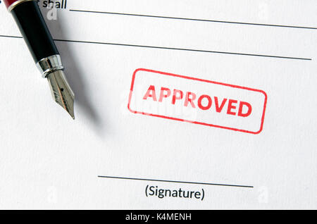 Approved stamp on document. Empty signature field, fountain pen. stamp approve document certificate contract agreement lawyer notary concept Stock Photo