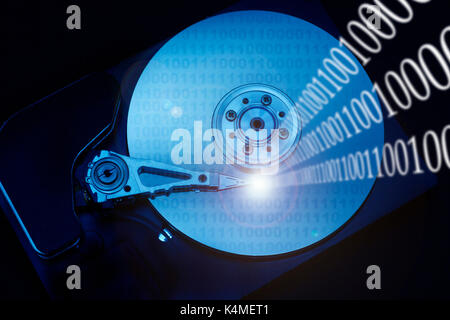 hard disk and binary digits, data managing and computing concept Stock Photo