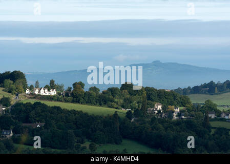 An early morning view from Amberley Gloucestershire England UK over the Nailsworth Valley and Longhope towards May Hill. The southern Cotswolds region. Stock Photo