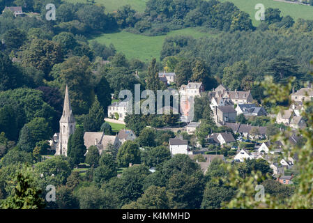 An overview of Woodchester and St Marys Church from Amberley Gloucestershire England UK over the Nailsworth Valley Stock Photo