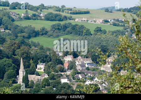 An overview of Woodchester and St Marys Church from Amberley Gloucestershire England UK over the Nailsworth Valley Stock Photo