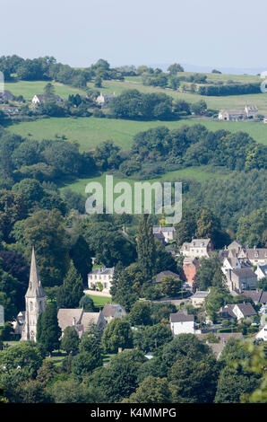 An overview of Woodchester and St Marys Church from Amberley Gloucestershire England UK over the Nailsworth Valley Stock Photo