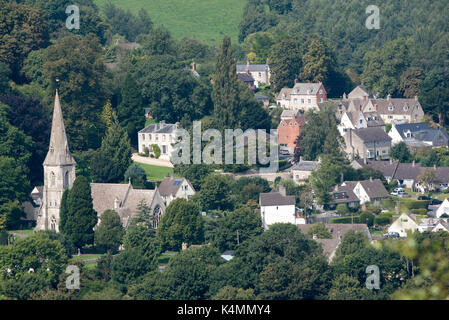 An overview of Woodchester and St Marys Church from Amberley Gloucestershire England UK over the Nailsworth Valley Stock Photo