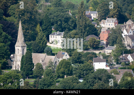 An overview of Woodchester and St Marys Church from Amberley Gloucestershire England UK over the Nailsworth Valley Stock Photo