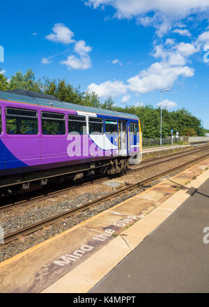 Northern line Class 144 Pacer train on east coast line leaving Seaton Carew station. UK Stock Photo