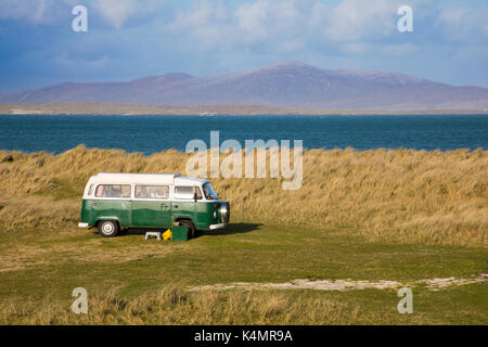 The machair and Volkswagen camper van, Isle of Berneray, North Uist, Outer Hebrides, Scotland, United Kingdom, Europe Stock Photo