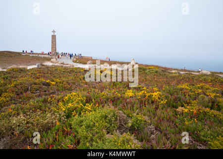 Cross on Cabo da Roca, Portugal - the most western point of European continent Stock Photo