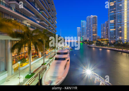 City skyscrapers and Miami River at dusk in Downtown Miami, Miami, Florida, United States of America, North America Stock Photo