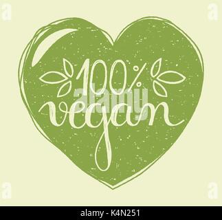 Hand lettering of the text 100 percent vegan in a hand drawn green heart with grunge stamp effect. Stock Vector