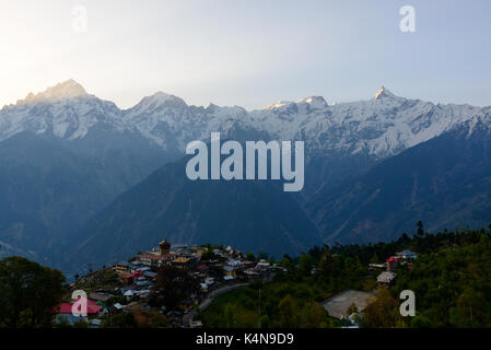 Kalpa village and Kinnaur Kailash sacred peak at sunrise view Stock Photo