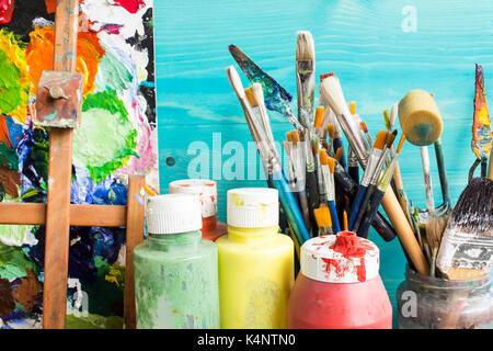 Painting equipment, paint, brushes and  pallet. Stock Photo