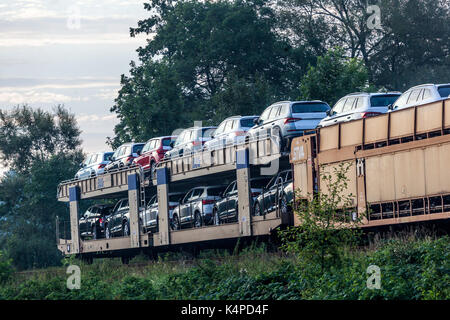 New Skoda cars on railway wagons produced by Skoda car factory Kvasiny, Czech Republic Stock Photo