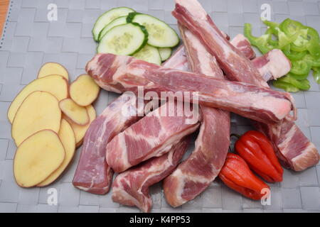 Raw beef ribs with organic vegetables Stock Photo