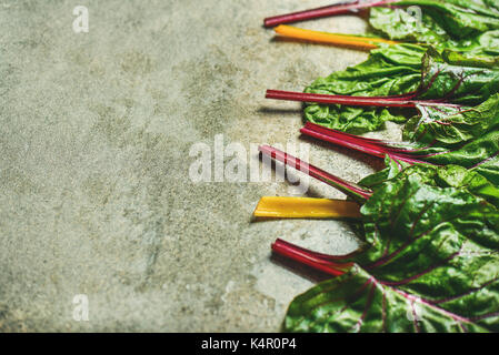 Flat-lay of fresh leaves of swiss chard, food frame Stock Photo