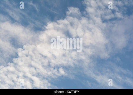 Abstract and unusual cloud formation against a blue sky, suitable for heavenly backgrounds and the clasifying of cloud and weather types. Close up pos Stock Photo