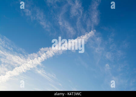 Abstract and unusual cloud formations against a blue sky, suitable for heavenly backgrounds and the clasifying of cloud and weather types. Potentially Stock Photo