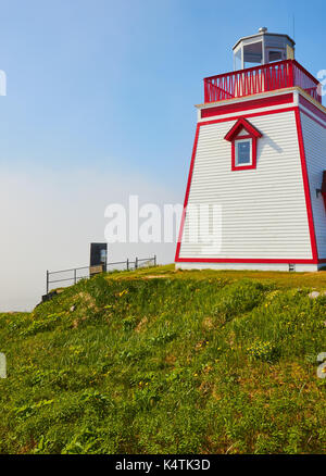 Fishing Point (Fox Point) Lighthouse and fog horn, St Anthony, Great Northern Peninsula, Newfoundland, Canada Stock Photo