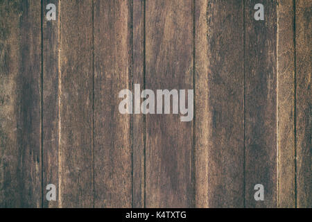 Vintage surface wood table and rustic grain texture background. Close up of dark rustic wall made of old wood table planks texture. Rustic brown wood  Stock Photo