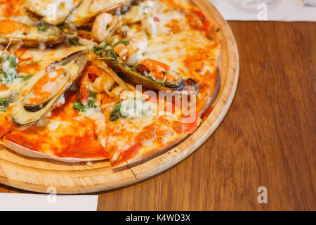 Meat Pizza Fast Food On Wooden Plate Background. Stock Photo