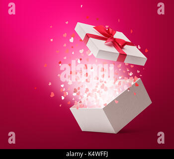 Hearts confetti popping out from white gift box Stock Photo