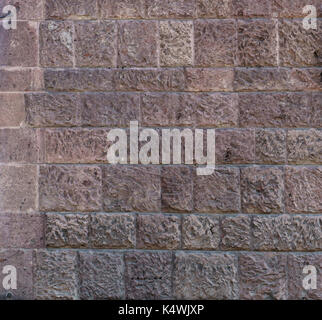 Brick wall. Big brown brick wall background and texture. Red Brown Brick Wall With Shabby Structure. House Facade. Wall of big red-brown bricks Stock Photo