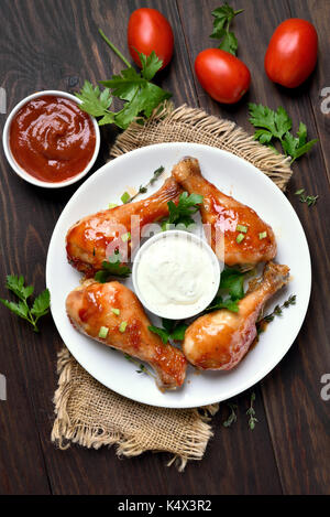 Baked chicken drumsticks, top view Stock Photo
