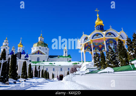 Pochaev lavra. View from holy gate. Summer altar and domes of Dormition Cathedral are in Pochaev lavra. Stock Photo