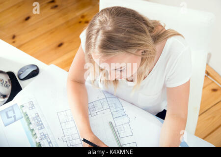 Top view at architect's desk where architect is working Stock Photo