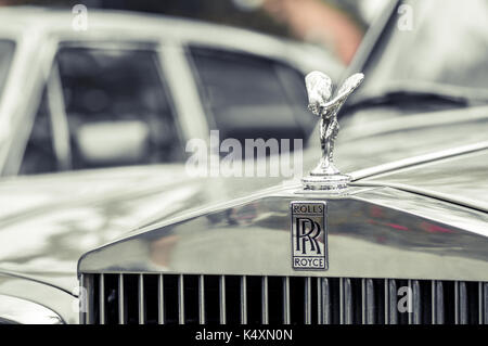 WROCLAW, POLAND -  AUGUST 19th, 2017: Hood ornament on a vintage Rolls Royce car. Rolls-Royce is a British luxury car and aero engine manufacturing bu Stock Photo
