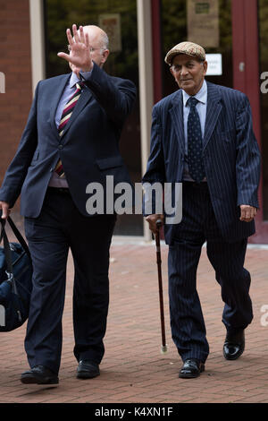 Kailash Chander (right), 79, leaves Coventry Magistrates' Court where he is charged with two counts of causing death by dangerous driving and causing serious injury by dangerous driving. The charges relate to a crash in Trinity Street, Coventry, in October 2015 which resulted in the death of eight-year-old Rowan Fitzgerald, a passenger on the bus, and pedestrian Dora Hancox. Stock Photo