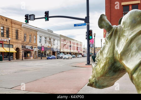 Sheridan, USA - October 30, 2016: Bronze rhino on a pavement. This sculpture called The Boss was created by Dollores B. Shelledy. Stock Photo