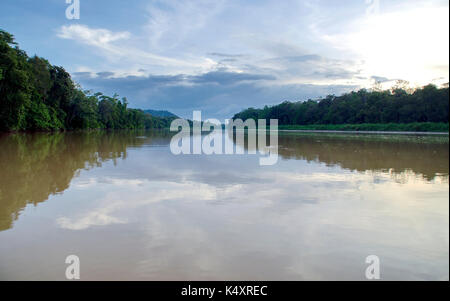 Kinabatangan, Malaysia - 09 May 2013 : Tourists on a boat cruise along the river of Kinabatangan, some of the most diverse concentration of wildlife i Stock Photo