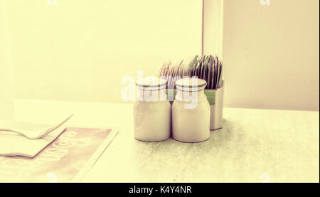 Salt and pepper on the table in the restaurant Stock Photo