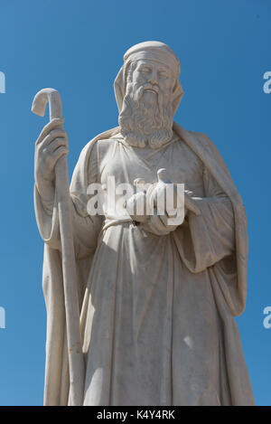 Marble white statue at the entrance of the basilica of the Blessed Virgin Of Ta Pinu Stock Photo