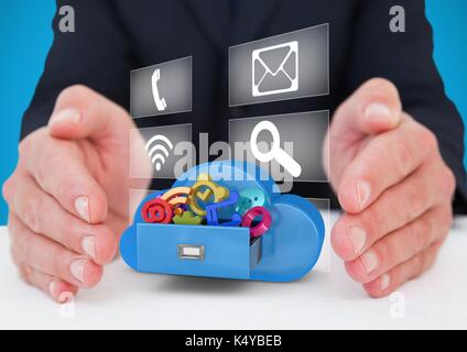 Digital composite of hands with application icons on a cloud  and with icons panel behind between two hands Stock Photo