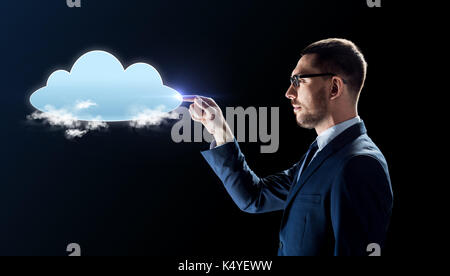 businessman working with virtual cloud hologram Stock Photo