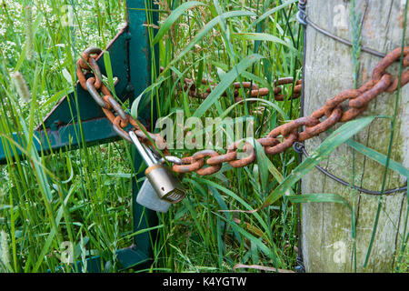 The gates on the chain are closed for two locks Stock Photo