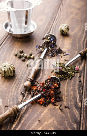 Background with different types of tea leaves Stock Photo