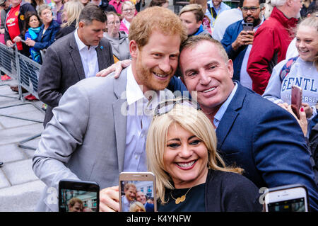 Belfast, Northern Ireland. 07/09/2017 -  People have their photos taken with Prince Harry as he meets the public during walkabout in Belfast on his first Northern Ireland visit. Stock Photo