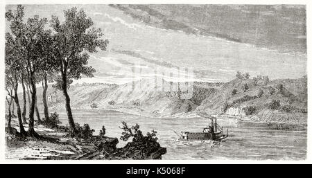 Ancient panoramic view from a bank of Missouri river with a boat that sails its waters. Missouri river USA. By Guaiaud after The Geological Survey of Missouri published on Le Tour du Monde Paris 1862 Stock Photo