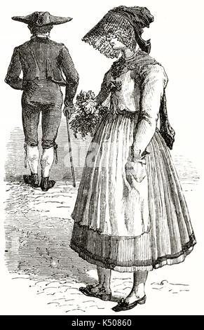 Profile view of an ancient medieval Stuttgart woman in her traditional costume , Germany, near to a man seen from behind. Created by Lancelot and Gauchard published on Le Tour du Monde Paris 1862 Stock Photo