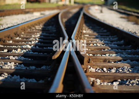 Railway crossroads. Choosing right way, making decision concept. Stock Photo