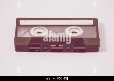Vintage cassette tape in close up on white background Stock Photo