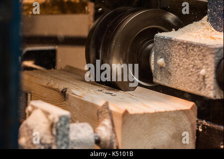 Cut Rabbet With Straight Router Bit Close up of a straight router bit cutting a groove or rabbet in a Stock ...